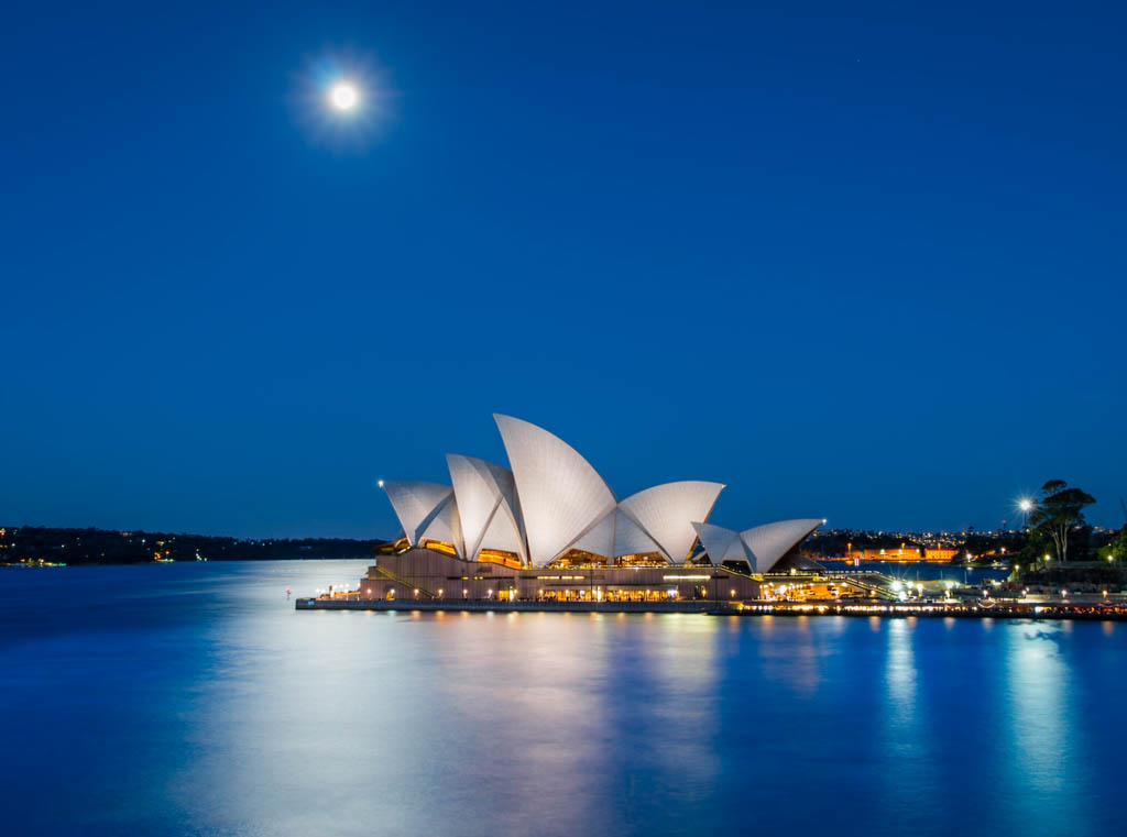 Opera house in Sydney, Australia at night by moonlight