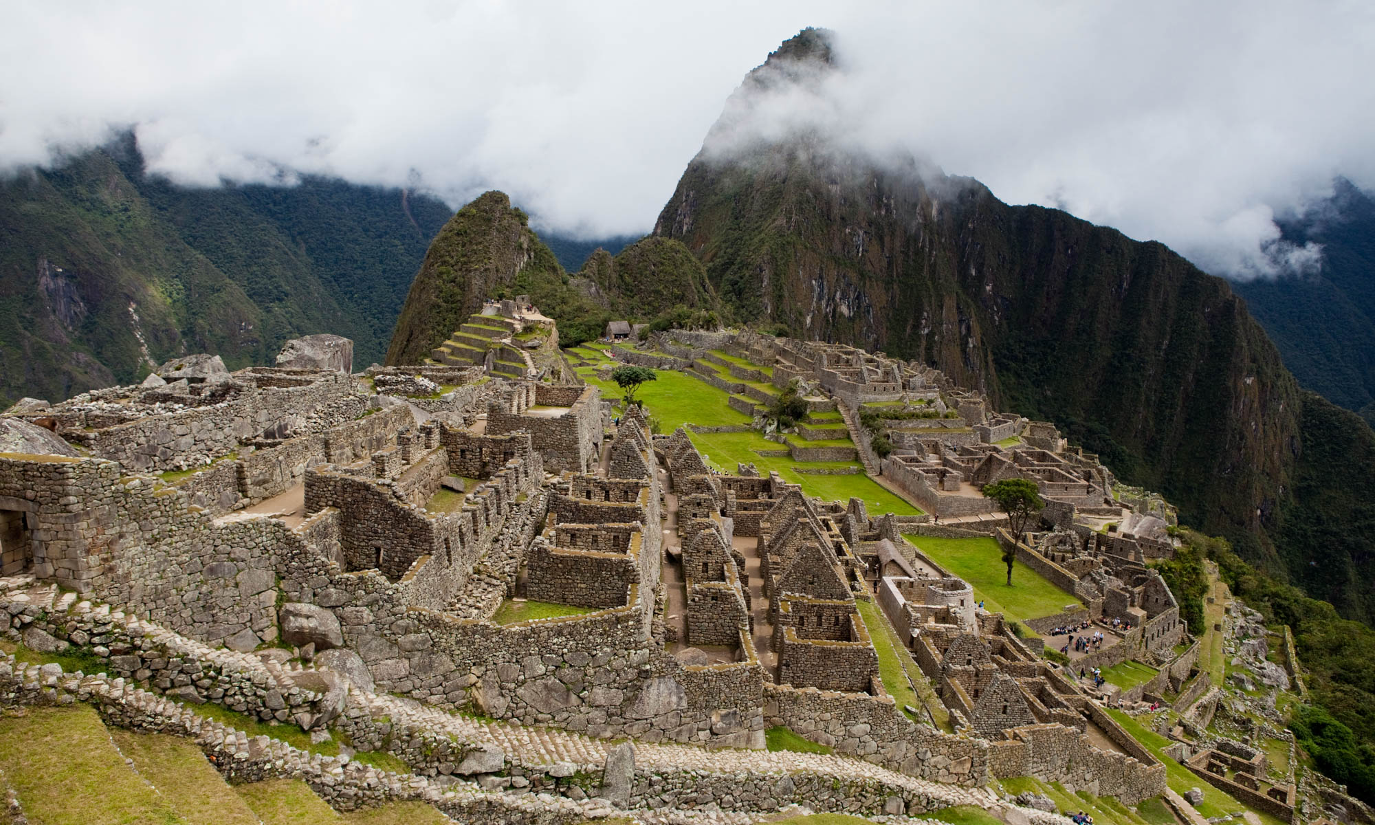 The ruins of Machu Picchu in the fog