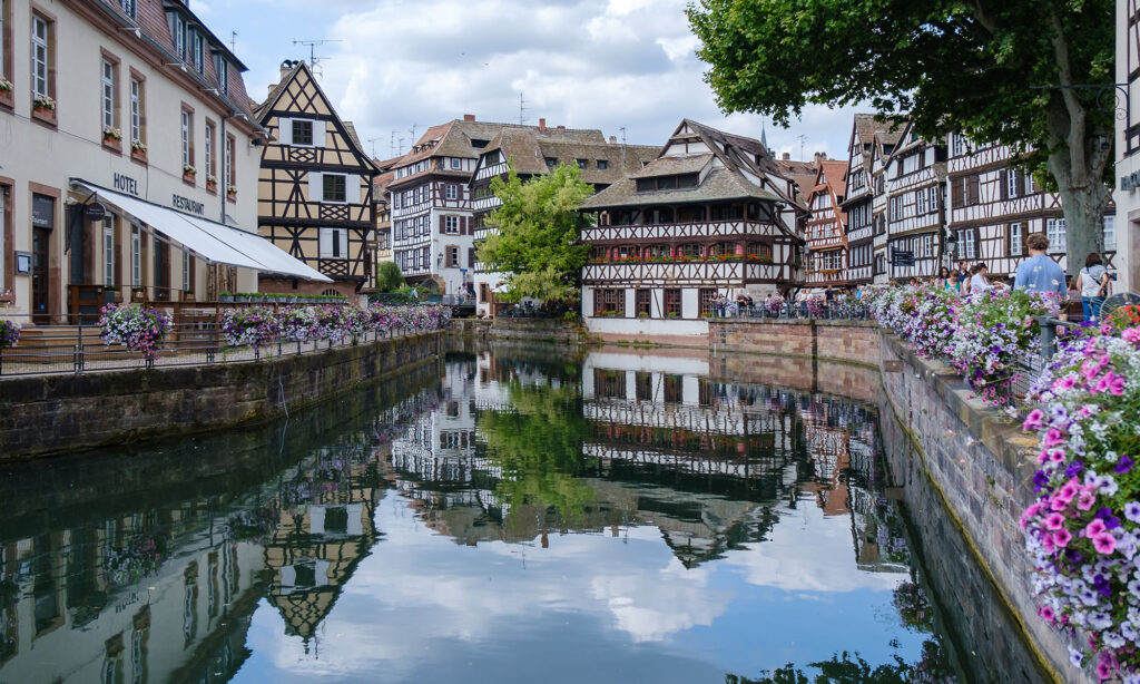Historic buildings along a river in Strasbourg, France